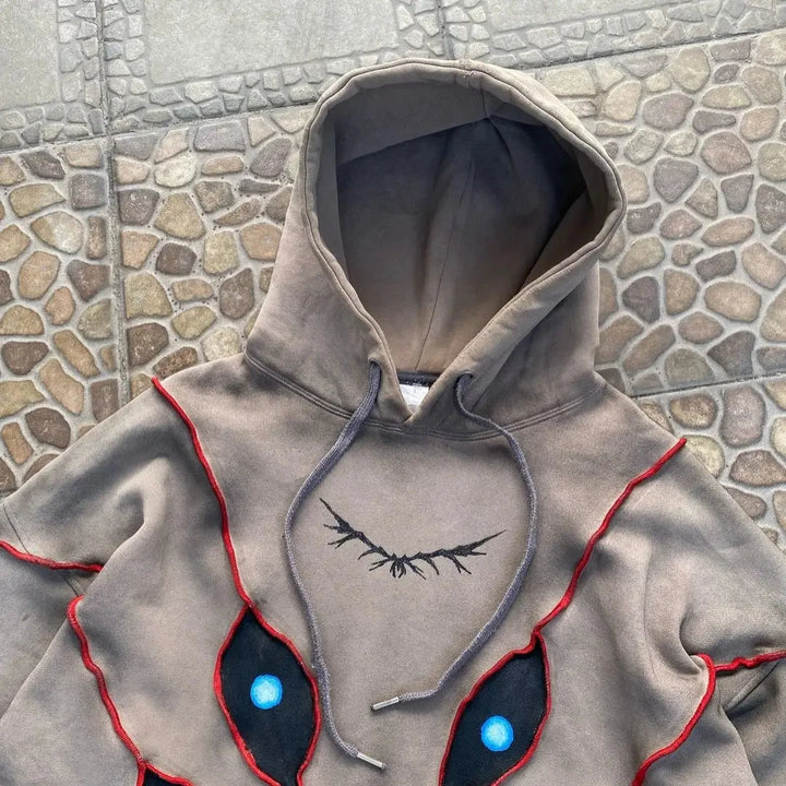 Glaring Gaze Patchwork Hoodie